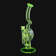 Kadabra Ion Swiss Rig in neon green glass with a bent neck and opal accent from 710 Pipes Smoke Shop