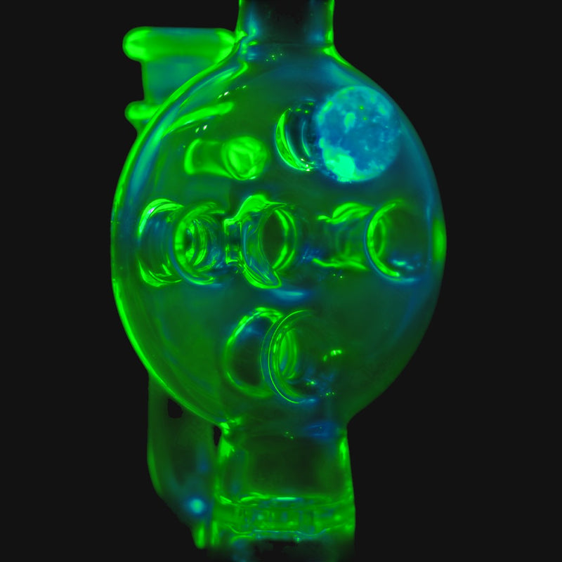 710 Pipes Smoke Shop Kadabra Ion Swiss rig featuring glowing green borosilicate glass with intricate percolator design