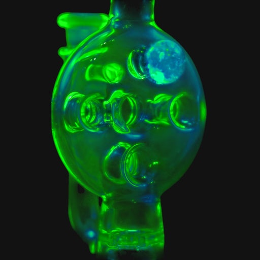 710 Pipes Smoke Shop Kadabra Ion Swiss rig featuring glowing green borosilicate glass with intricate percolator design
