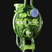 710 Pipes Smoke Shop Kadabra Ion Swiss rig in neon green glass with a decorative opal inlay.