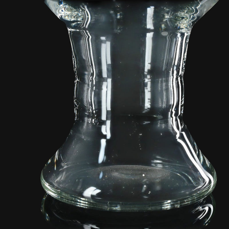 710 Pipes Smoke Shop locally made clear glass pint glass with a flared base design on a black background.