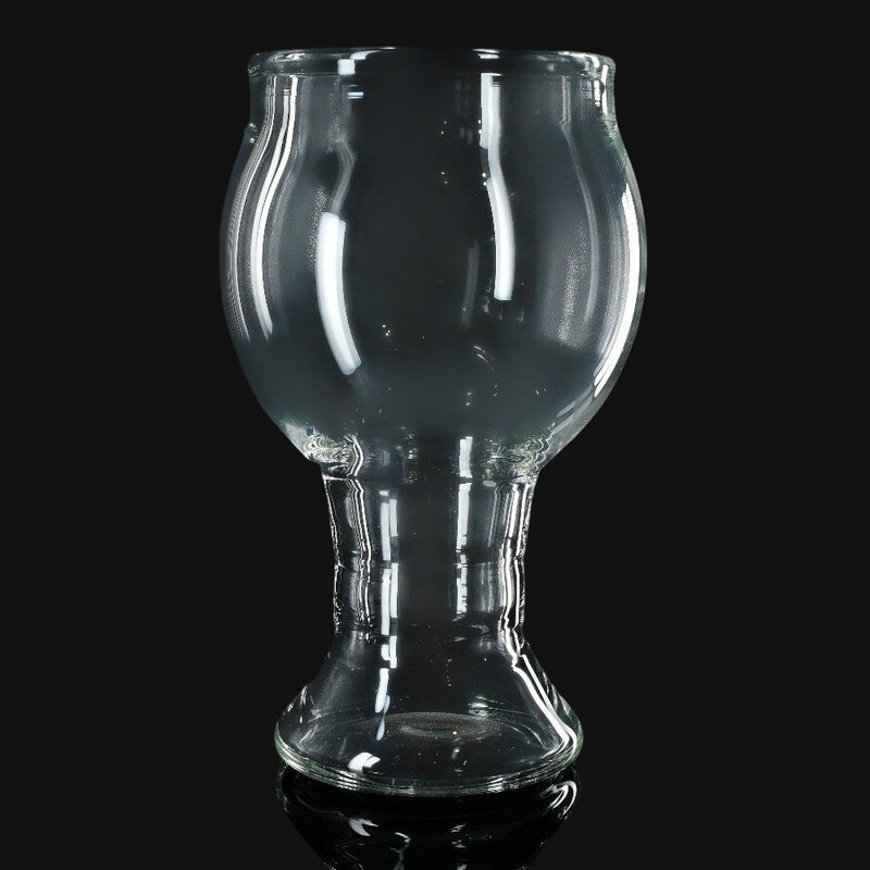 710 Pipes Smoke Shop Kadabra clear glass pint glass with a unique bulbous shape on a black background.
