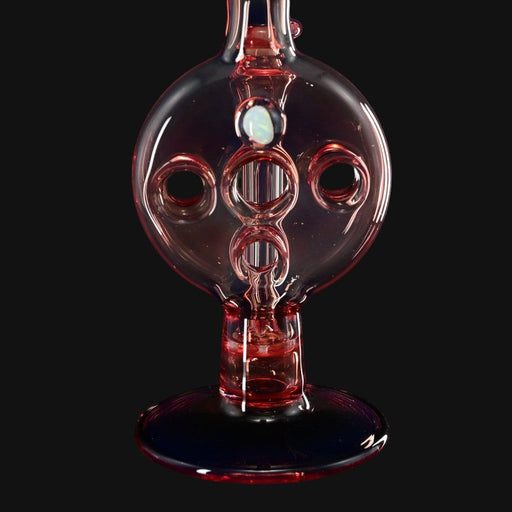 710 Pipes Smoke Shop Kadabra Swiss rig in Purple Rain glass with intricate percolator holes and an embedded opal.
