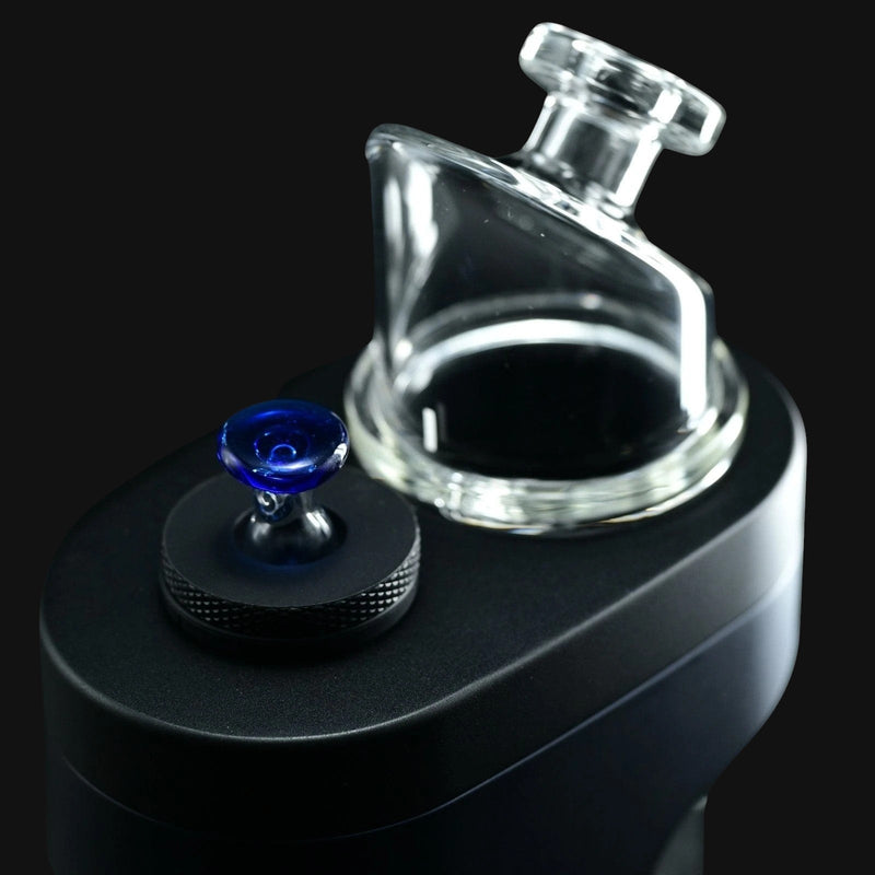 710 Pipes Smoke Shop Kadabra Switch2 clear and blue glass joystick carb cap for dabbing on a black background