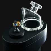 710 Pipes Smoke Shop Kadabra Switch2 Milli joystick cap featuring colorful glass patterns on a black vaporizer base.