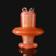 710 Pipes Smoke Shop Kadabra Switch2 spinner cap in orange shimmer glass with a unique dual-top airflow design.