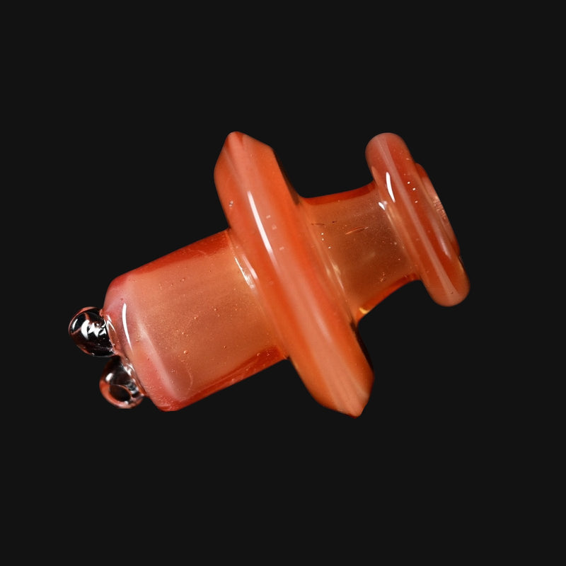 710 Pipes Smoke Shop Kadabra Switch2 spinner cap in orange shimmer glass with dual airflow intake ports.