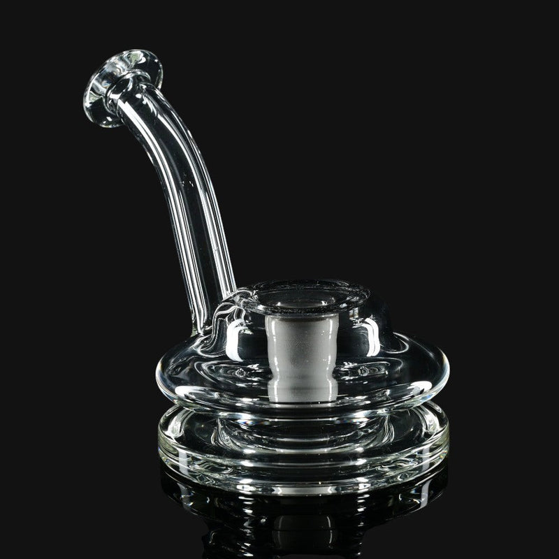 Clear glass Kadabra Terp Taster pipe by 710 Pipes Smoke Shop featuring a curved mouthpiece and wide base.