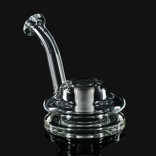Clear glass Kadabra Terp Taster pipe by 710 Pipes Smoke Shop featuring a curved mouthpiece and wide base.