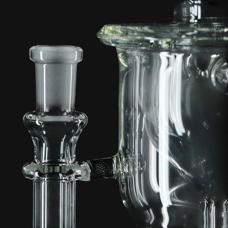 Clear glass Kadabra Hourglass Torus Incycler from 710 Pipes Smoke Shop featuring a frosted joint connection.
