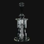 Clear glass Kadabra Hourglass Torus Incycler dab rig from 710 Pipes Smoke Shop with intricate recycler design.