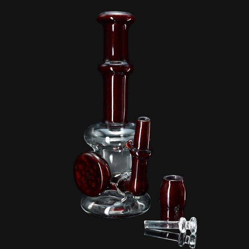 710 Pipes Smoke Shop Local Water Pipe 100, clear glass bong with dark red accents and a circular disc.