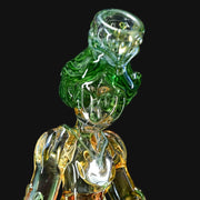 710 Pipes Smoke Shop Lyric Princess Rig in green and clear glass, featuring a sculpted female figure with intricate details.