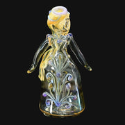 710 Pipes Smoke Shop Lyric Princess Rig in clear glass with purple and yellow accents, featuring intricate detailing.