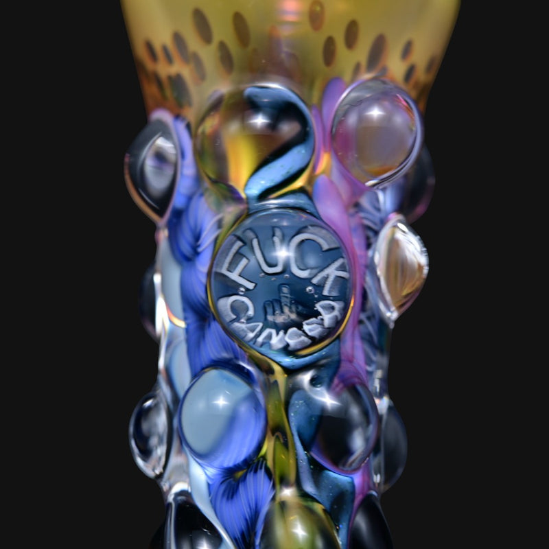 710 Pipes Smoke Shop Matty White glass one hitter with bumpy texture, blue and yellow accents, and Fuck Cancer millie