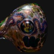 710 Pipes Smoke Shop Matty White ISO worm spoon glass pipe featuring a detailed peace sign milli design