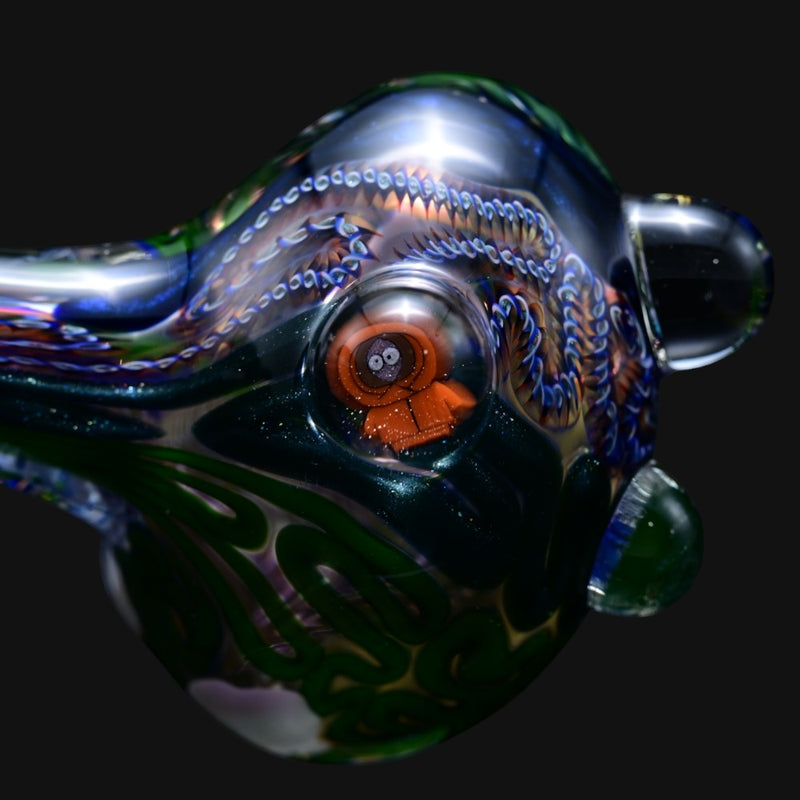 710 Pipes Smoke Shop Matty White glass spoon pipe featuring a detailed South Park Kenny character encased in glass.