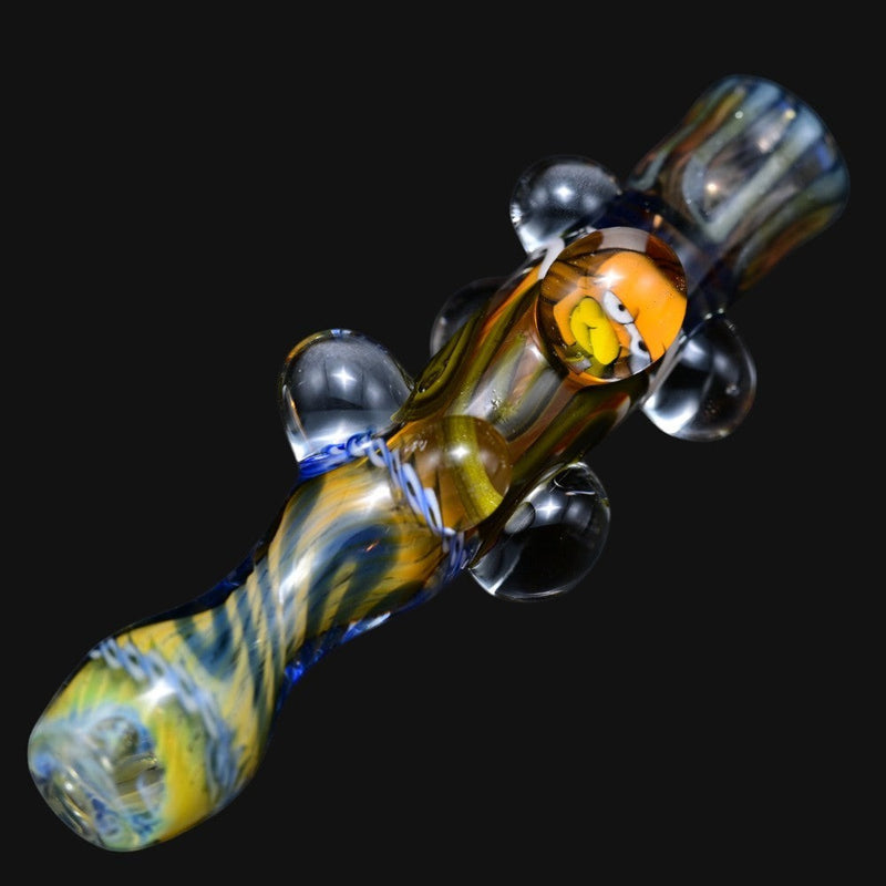 710 Pipes Smoke Shop Matty White glass one hitter pipe featuring a yellow Simpsons character accent and blue swirls.