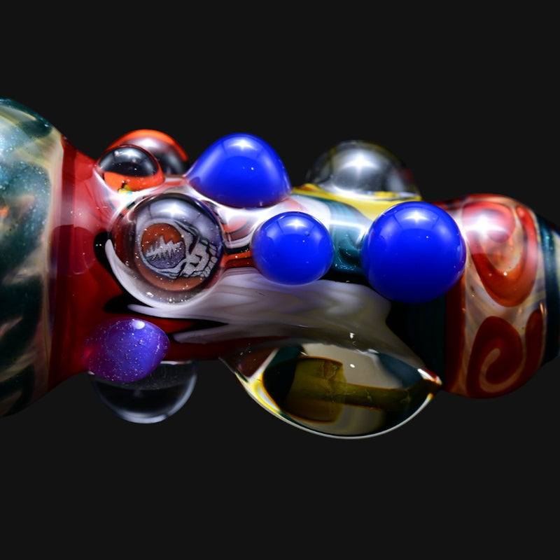 710 Pipes Smoke Shop Matty White Xtreme One Hitter glass pipe featuring a Grateful Dead skull and blue glass beads