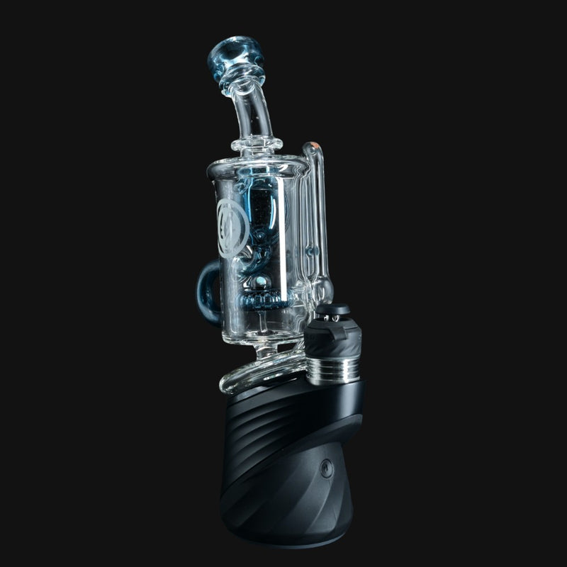 710 Pipes Smoke Shop OJ Flame Peak Incycler dab rig in blue stardust glass with a black base.
