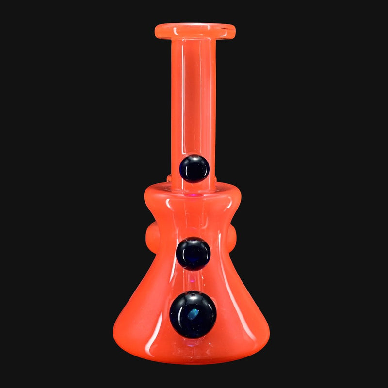 710 Pipes Smoke Shop orange glass dab rig with 14mm joint and three dark blue glass accents.