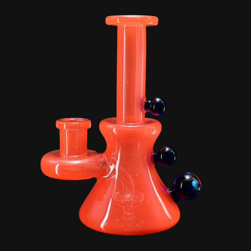 710 Pipes Smoke Shop orange glass water pipe with 14mm joint and blue accents.