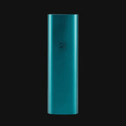 Teal Pax 3 portable dry herb and concentrate device from 710 Pipes Smoke Shop with a sleek metallic finish.