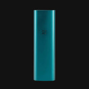 Teal Pax 3 portable dry herb and concentrate device from 710 Pipes Smoke Shop with a sleek metallic finish.