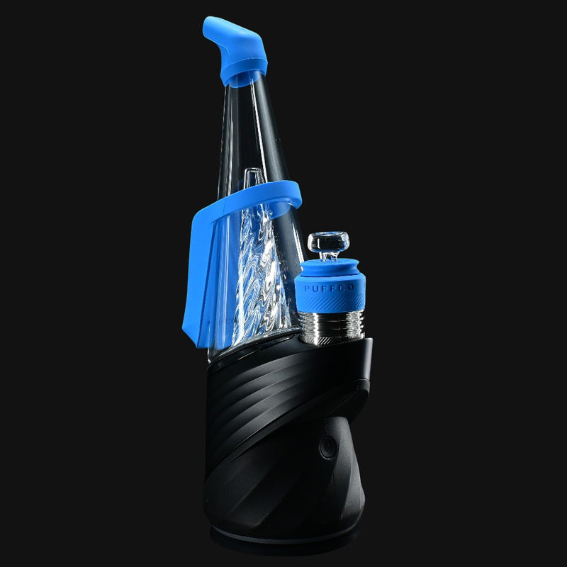 710 Pipes Smoke Shop Peak Pro Travel Pack with blue silicone mouthpiece, carb cap, and chamber jacket on black base.