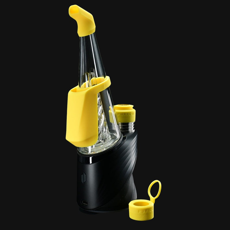 710 Pipes Smoke Shop Peak Pro Travel Pack with yellow silicone accessories including mouthpiece and carb cap.