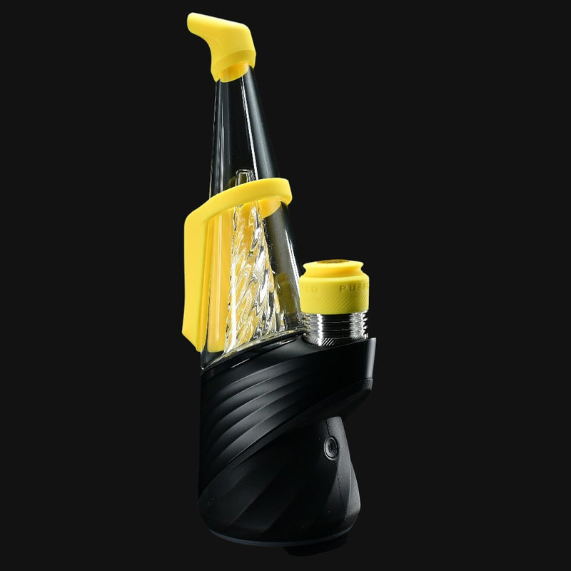 710 Pipes Smoke Shop Peak Pro Travel Pack with yellow silicone mouthpiece, carb cap, and chamber jacket on black base