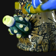 710 Pipes Smoke Shop Peyote Sight Eagle glass bong with green, yellow, and blue accents. Features mushroom art.