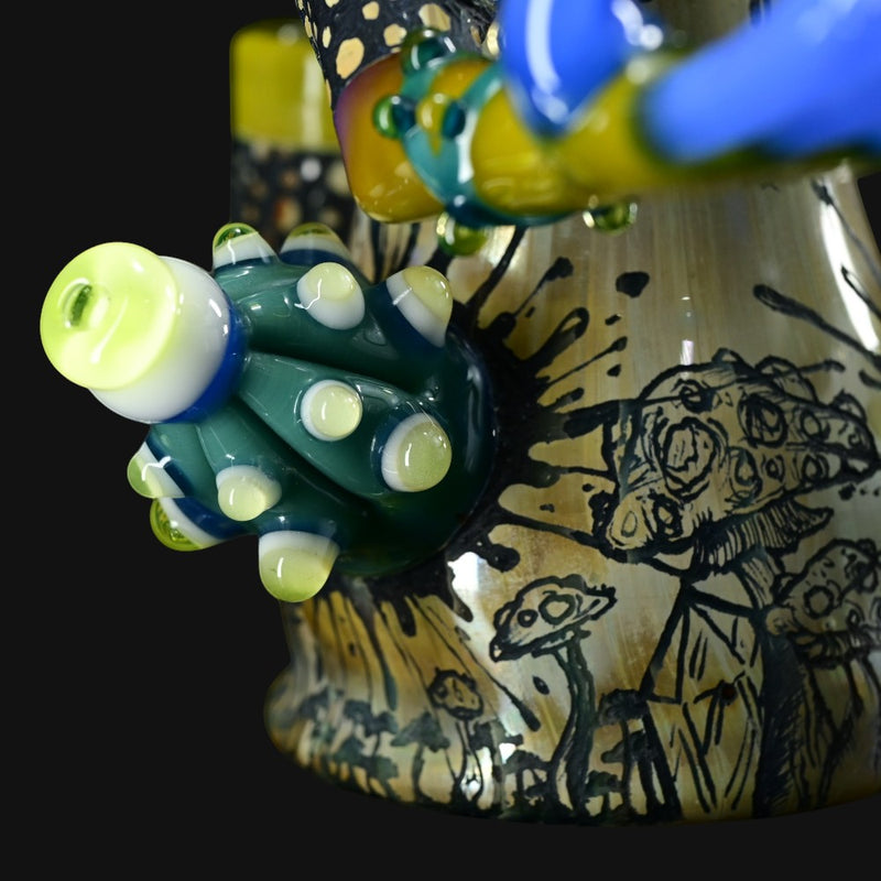 710 Pipes Smoke Shop Peyote Sight Eagle glass bong with green, yellow, and blue accents. Features mushroom art.