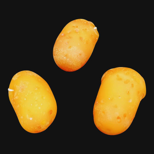 Three AlecBlowsGlass potato pendants from 710 Pipes Smoke Shop, featuring realistic yellow glass textures.