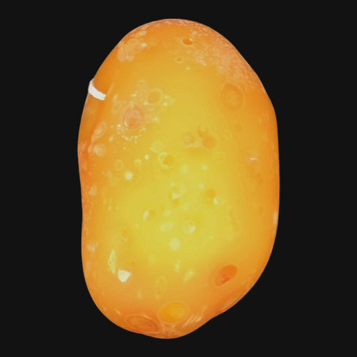 710 Pipes Smoke Shop AlecBlowsGlass potato pendant featuring a textured, translucent orange glass design.