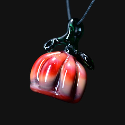 710 Pipes Smoke Shop Death Card Glass pumpkin pendant with red and white glass body and dark green stem on black cord
