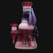 710 Pipes Smoke Shop purple and pink glass rig with red accents, featuring a 3-hole perc and worked neck and base.