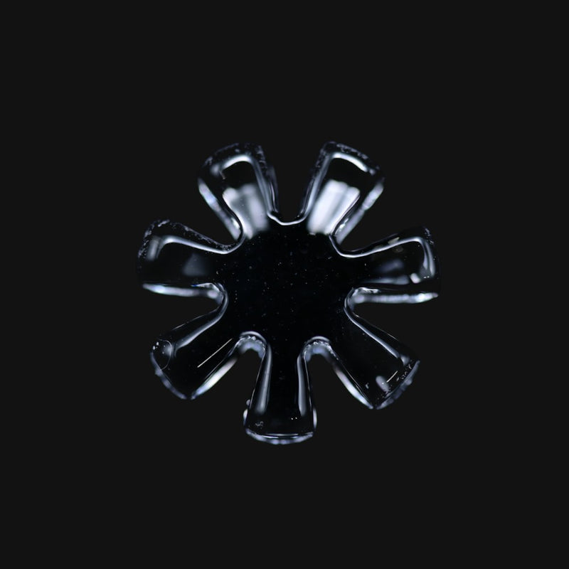 710 Pipes Smoke Shop Black Market Glass 12mm quartz flake with 7 blades on a black background