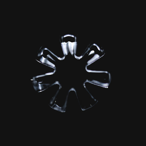 710 Pipes Smoke Shop Black Market Glass 13mm quartz flake with 7 blades, shown against a black background.