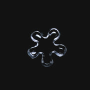 710 Pipes Smoke Shop Black Market Glass 11mm quartz flake with five rounded blades on a black background