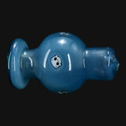 710 Pipes Smoke Shop Ras Glass blue bubble cap featuring white skull millie glass accents on a black background