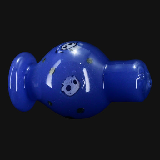 710 Pipes Smoke Shop Ras Glass blue spinner bubble cap featuring detailed skull millie designs and gold flecks