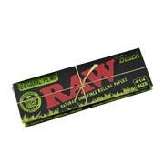 710 Pipes Smoke Shop Raw Black organic hemp 1 1/4 size rolling papers in black packaging with green grass detail
