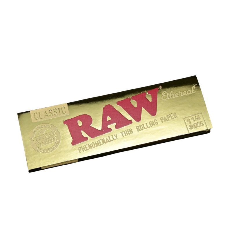 710 Pipes Smoke Shop RAW Ethereal 1 1/4 size rolling papers in a gold metallic pack with classic red branding.