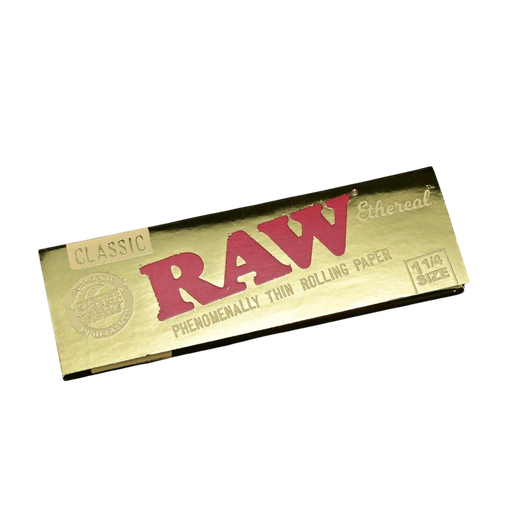 710 Pipes Smoke Shop RAW Ethereal 1 1/4 size rolling papers in a gold metallic pack with classic red branding.