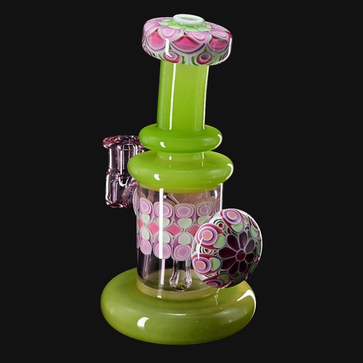 710 Pipes Smoke Shop RL. Dots Jammer glass water pipe with green accents and pink floral patterns.