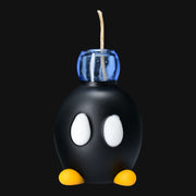 710 Pipes Smoke Shop Sandberg Large Mario Bomb glass pipe in black with white eyes, yellow feet, and blue top