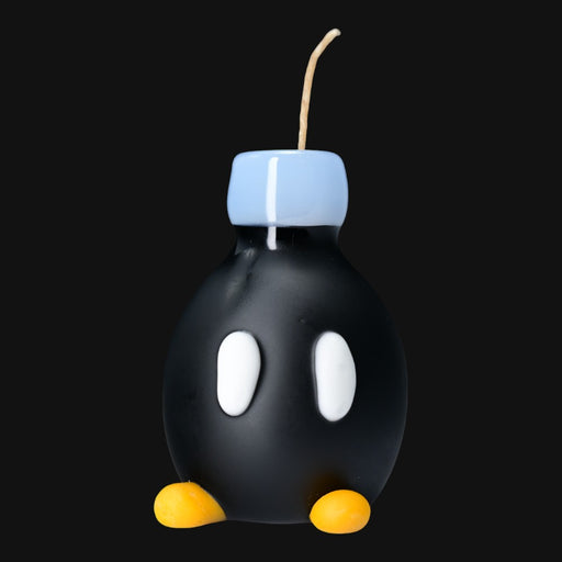 710 Pipes Smoke Shop Sandberg Large Mario Bomb glass pipe in black with white eyes, blue top, and yellow feet
