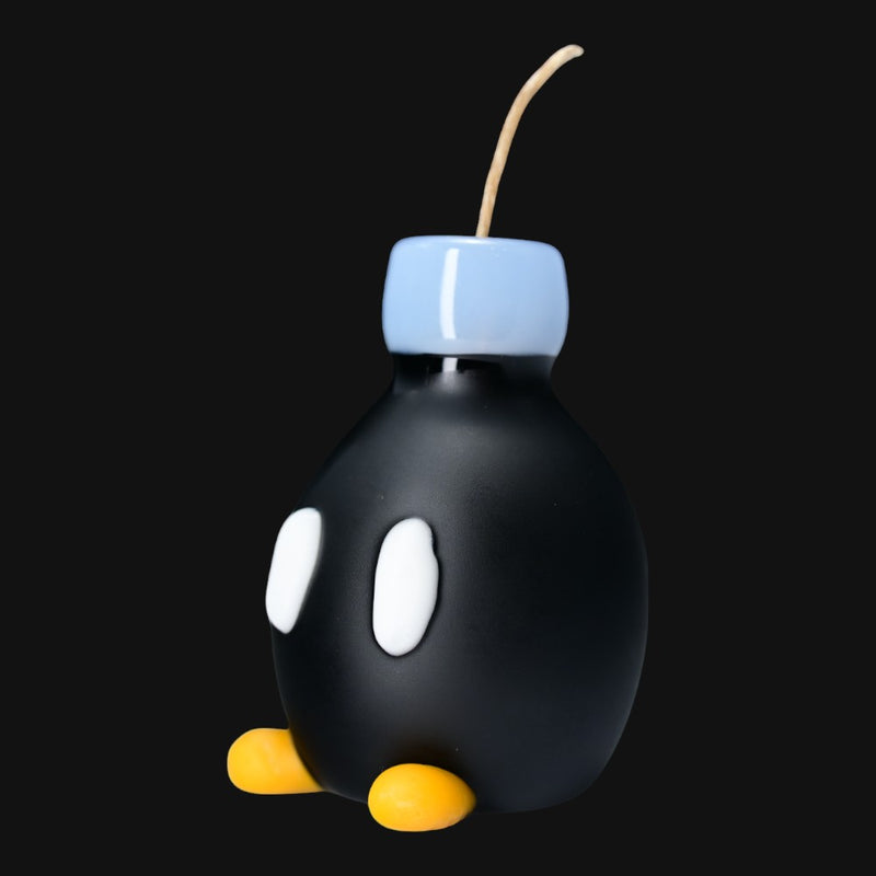 710 Pipes Smoke Shop Sandberg glass Mario bomb pipe in matte black with white eyes, blue top, and yellow feet
