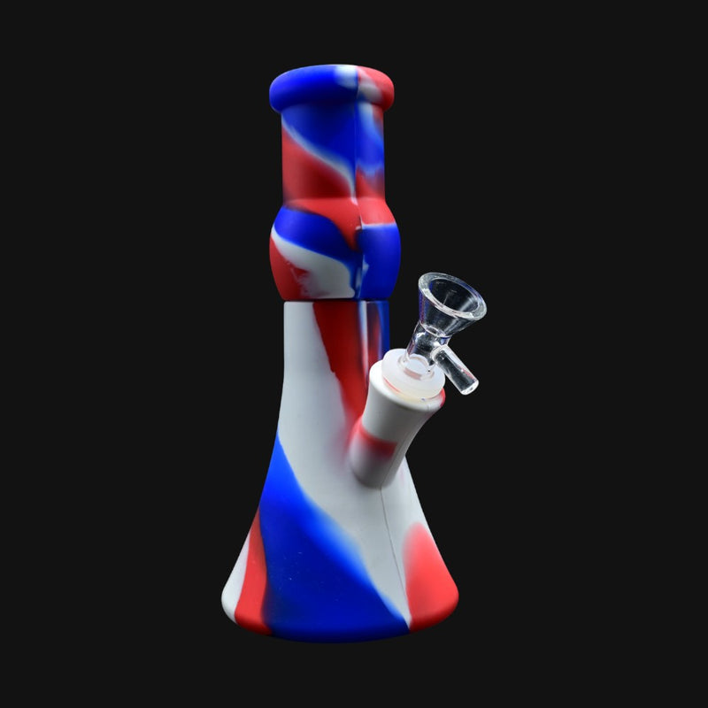 710 Pipes Smoke Shop 9-inch silicone beaker water pipe featuring a red, white, and blue swirl pattern with glass bowl.
